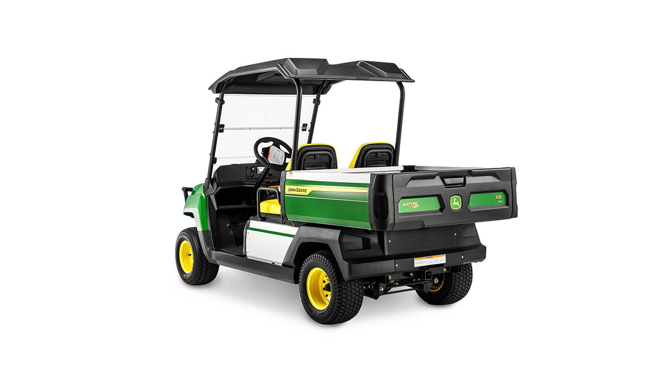 Zadní šikmý pohled na benzínový model John Deere Gator GS s nákladním prostorem, dvojitými sedadly a ochrannou střechou.